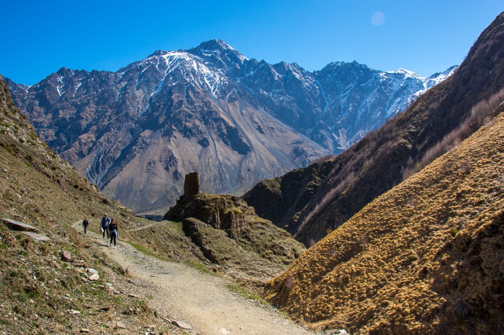 ruined tower Gergeti Trinity Church hiking path
