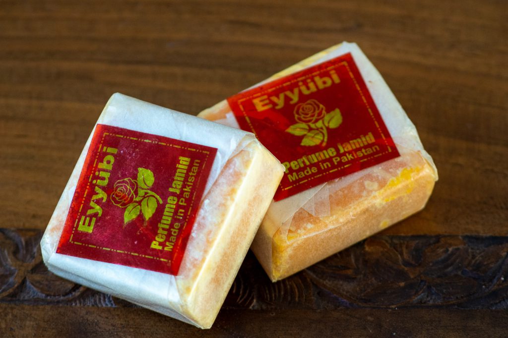 two pieces of inexpensive synthetic musk or Perfume Jamid