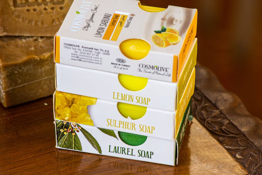 four natural soaps: lemon. sulphur and turmeric