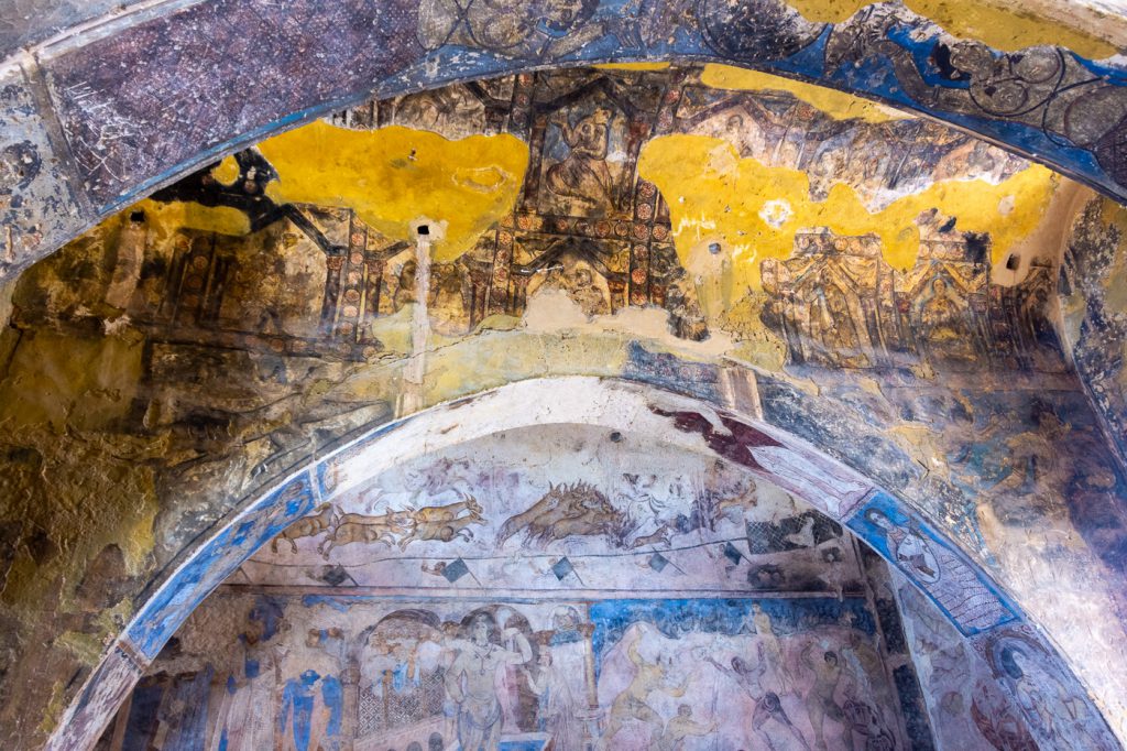 beautiful detailed frescoes at Qasr Amra