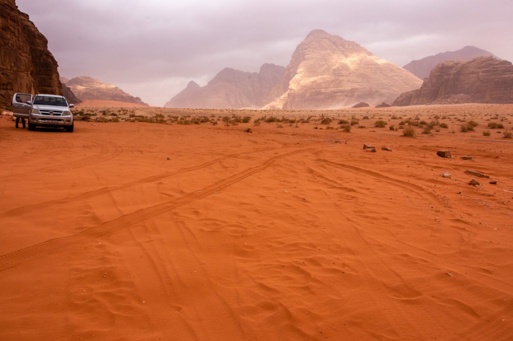 A glimpse of the sun on our stormy Day Trip to Wadi Rum