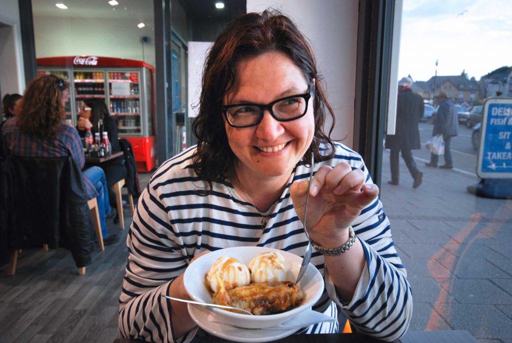 Anja eating a deep fried Mars Bar