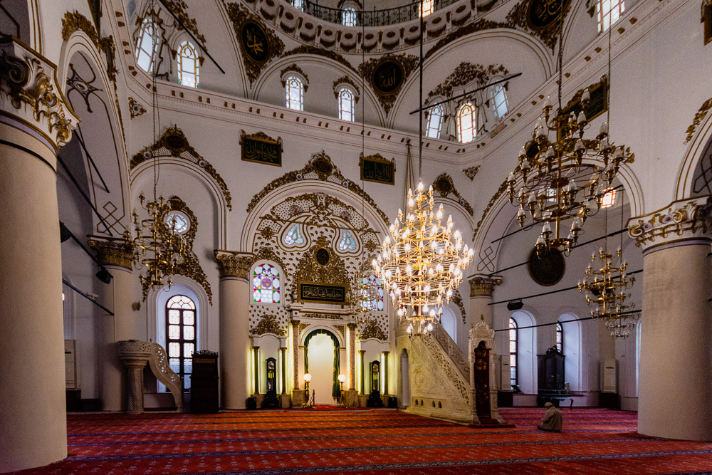 Main prayer room of the Hisar Mosque of Izmir, refined gold decorations on white background