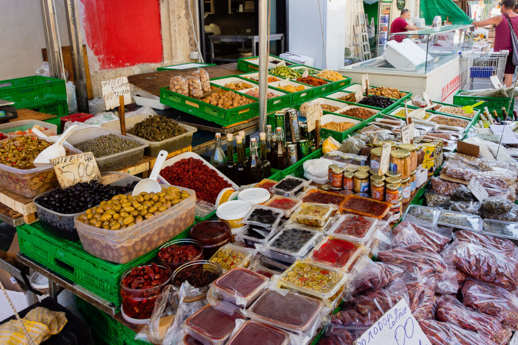 Shopping in Sicily also means a market visit, like this daily produce market in Ortigia