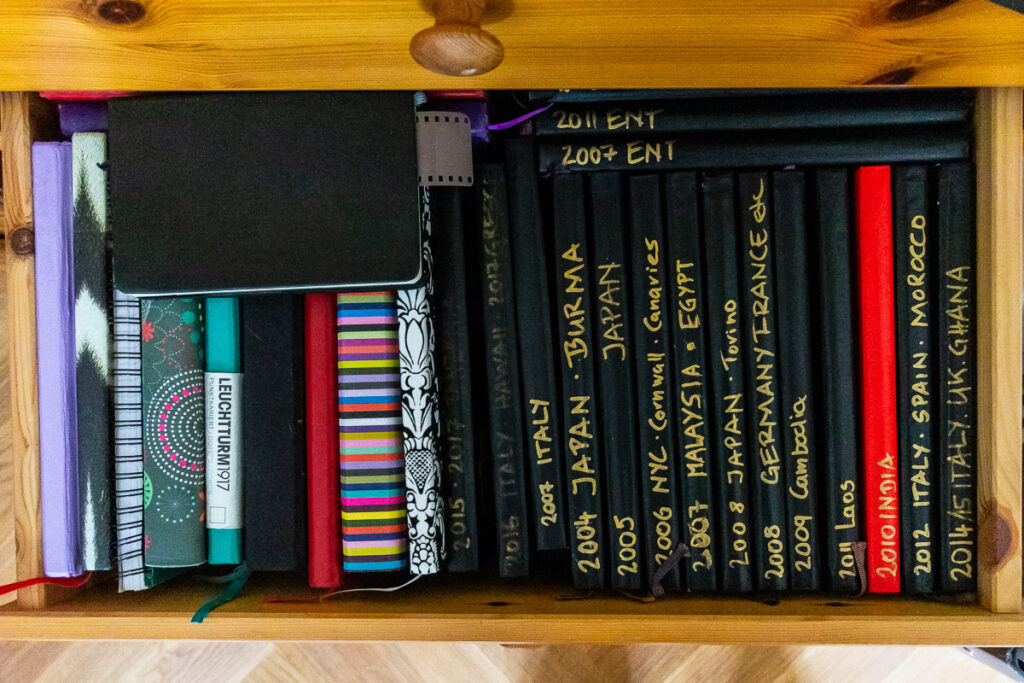 best notebooks for your travel journal : my drawer full of note books