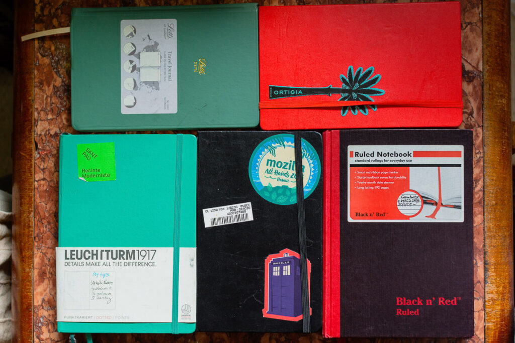 best notebooks for your travel journal : Moleskine, Letts, Leuchtturm, Black n' Red