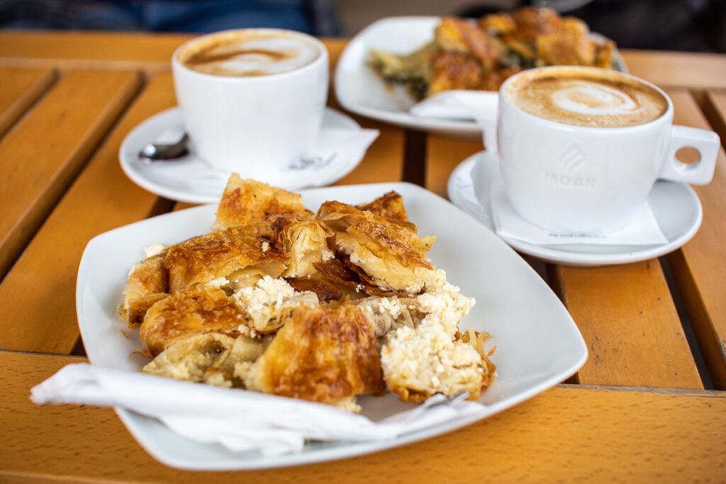 two plates of freshly baked cheese bougatsa, Nikiti